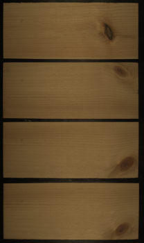 Snímky dřevěných desek s různě velkými a umístěnými suky.